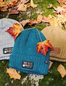 hats in fall leaves